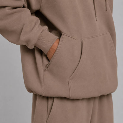 Reishoodie taupe - kangoeroezak zijrits detail